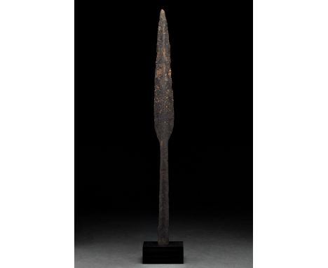 Ca. 100–300 AD. Roman. An iron spearhead with an elongated leaf-shaped blade with a raised central ridge, sharp tapering edge