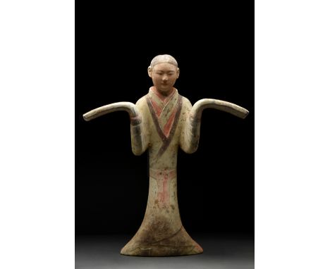 Ca. 202 BC–220 AD. Han Dynasty. A well-modelled, pottery standing female dancer with arms stretched out in opposite direction