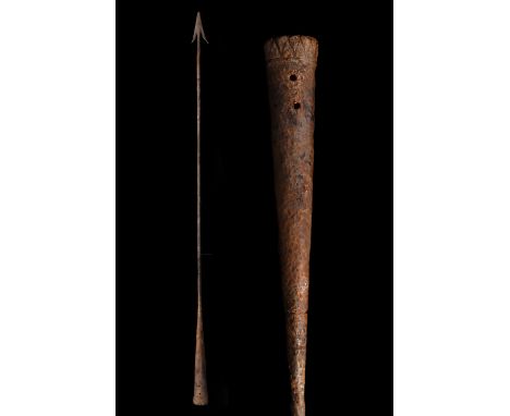 Ca. 100–300 AD. Roman. An iron pilum spearhead with a barbed, triangular blade, and a long twisted neck, and a robust flaring