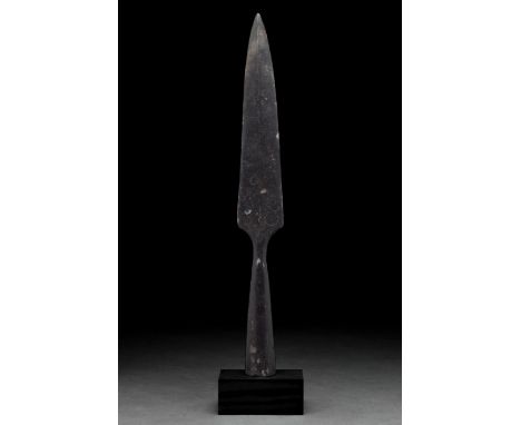 Ca. 1000–1200 AD. Viking Age. An iron spearhead with a leaf-shaped blade, raised midrib, sharp edges flaring slightly before 