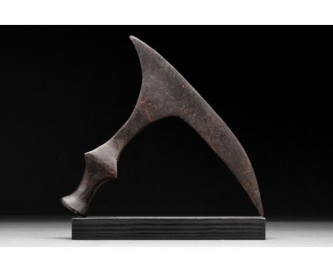 Ca. 900–1100 AD. Viking Age. An iron battle axe with a narrow, crescentic blade, tapering cheek, reinforced poll and socket. 