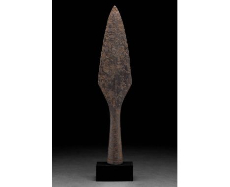Ca. 900–1100 AD. Viking age. An iron spearhead with a leaf-shaped blade, raised midrib, sharp edges flaring slightly before t