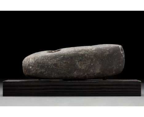 Ca. 5000–3000 BC. Neolithic. A nice boat-shaped pecked and ground axe head with square butt and rectangular in section, the g