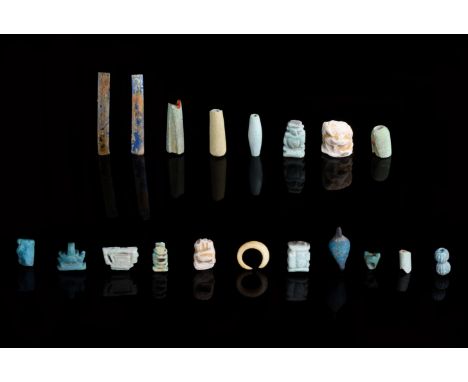 Ca. 664 - 332 B.C. Late Period. Egyptian. A group of amulets and beads including Bes, the dwarf headed deity of the household