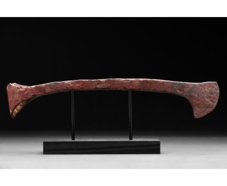 Ca. 900–1100 AD. Viking Age. An iron axe head with a very long, flaring cheek, curved blade, and reinforced poll. Good condit