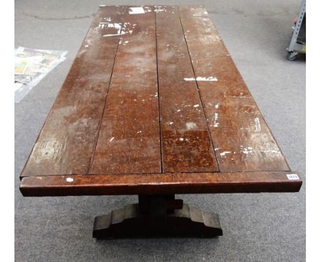 A 17th century style oak veneered plank top refectory table on trestle end standards, 84cm wide x 200cm long