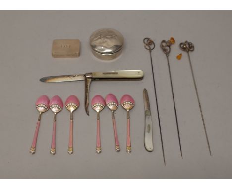 A set of six silver gilt, pink and white enamelled coffee spoons, Birmingham 1929 and silver and silver mounted wares, compri