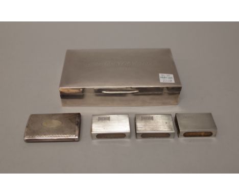 A silver table cigarette box, of rectangular form, wooden lined within, the cover presentation inscribed, probably Birmingham