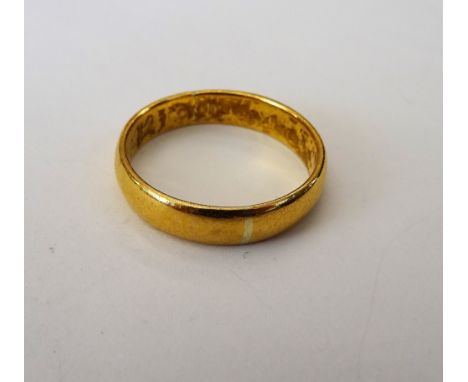 A 22ct gold plain wedding ring, Birmingham 1922, ring size R, weight 5.6 gms.