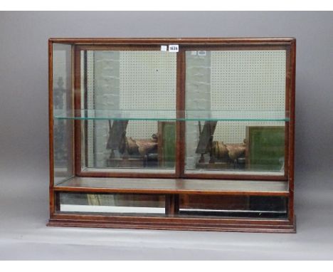 A 19th century mahogany framed table top display cabinet with a pair of mirror fronted lower drawers, 81cm wide x 63cm high. 