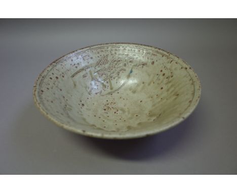 Jim Malone (born 1946), a bowl with celadon glaze over incised decoration, makers mark, 29cm diameter.  DDS