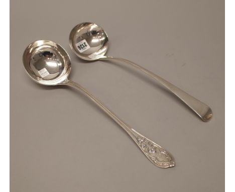 A George III silver Old English pattern soup ladle, London 1813 and a Victorian silver soup ladle, with cast decoration, Lond