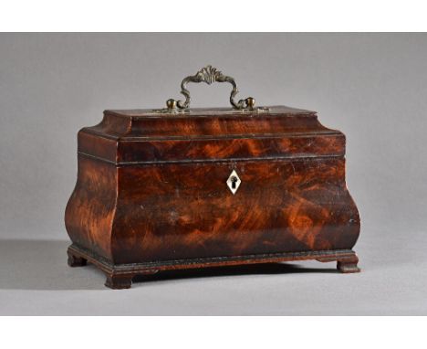 A mid-18th century mahogany tea caddy, of bloated sarcophagus form, on ogee bracket feet, 25cm wide x 16cm high. Illustrated.