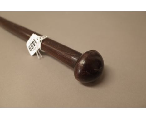 A South African hardwood long stick, with mushroom head pommel over a cylindrical shaft, 162cm.