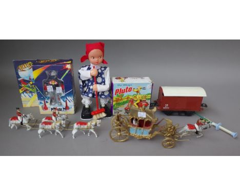 A quantity of collectable toys including; hollow cast lead figures, coronation coach and horses, three O gauge wagons, a poli