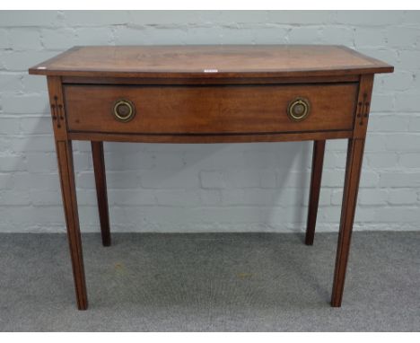 A George III inlaid mahogany bowfront single drawer side table, on tapering square supports, 91cm wide x 77cm high,