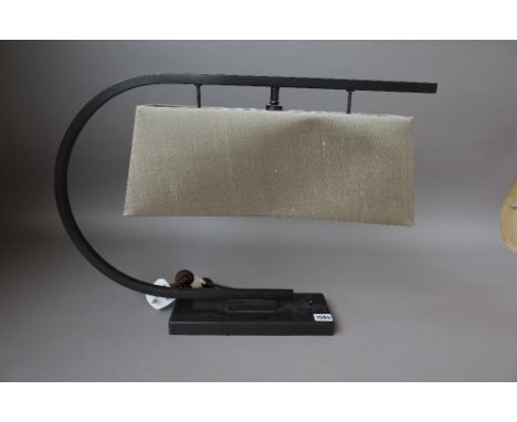 A Porta Romana 'Harry' table lamp, bronzed metal, gold shade, 42cm high. 