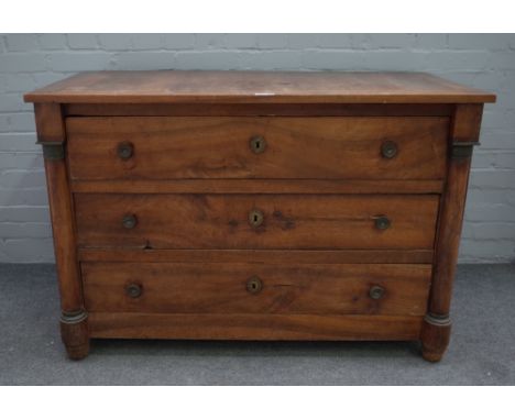 An early 19th century Continental gilt metal mounted walnut three drawer commode with split column mounts, 124cm wide x 84cm 