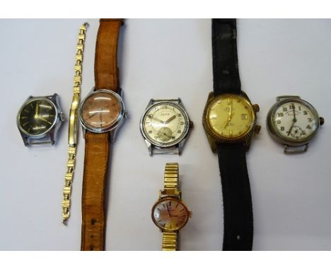 A Tissot 9ct gold circular cased lady's wristwatch, Birmingham 1973, on a gilt metal fronted expanding metal bracelet, five g