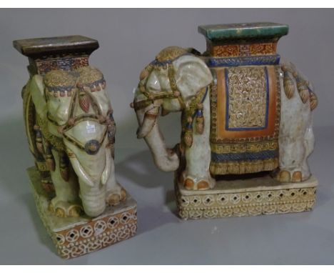 A pair of 20th century ceramic garden seats formed as elephants, 55cm high (2).