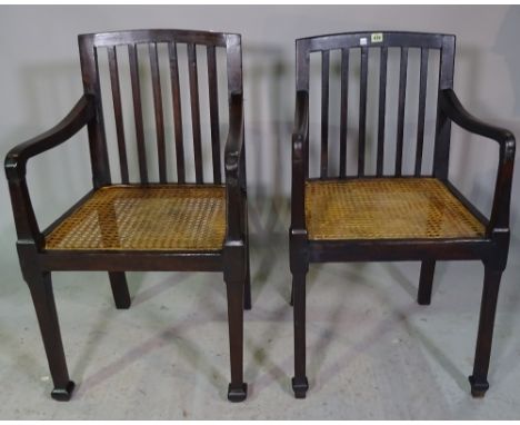 A set of four 19th century stained beech stick back open armchairs with cane work seats, (4). 