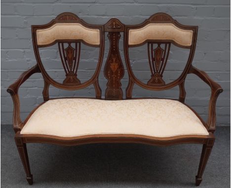 An Edwardian marquetry inlaid mahogany double chair back show frame sofa, on tapering square supports, 120cm wide x 94cm high