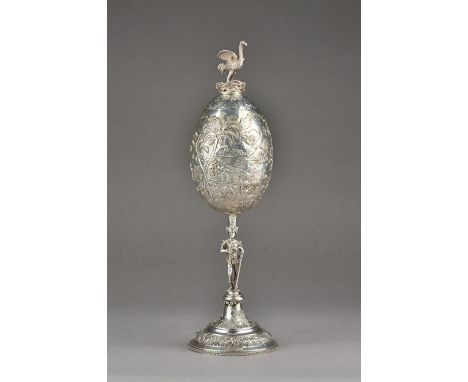 A European cup and cover, the body profusely decorated with camels, figures, birds, flora and fauna, in a landscape scene, wi