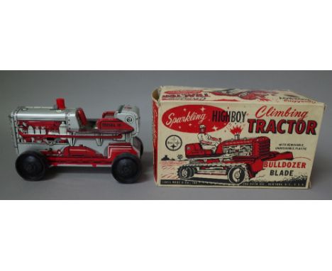 A Marx tinplate Highboy climbing tractor, with clockwork mechanism, boxed.