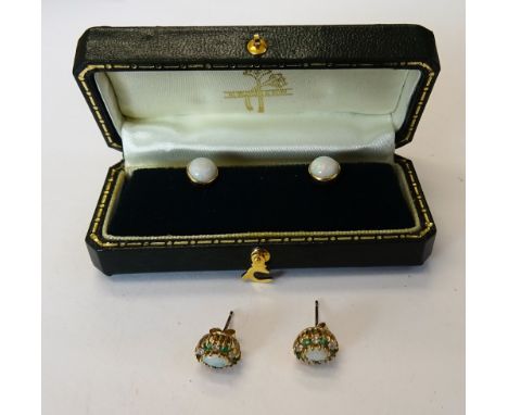 A pair of 9ct gold, opal, emerald and colourless gem set oval cluster earstuds and a pair of gold and opal single stone earst