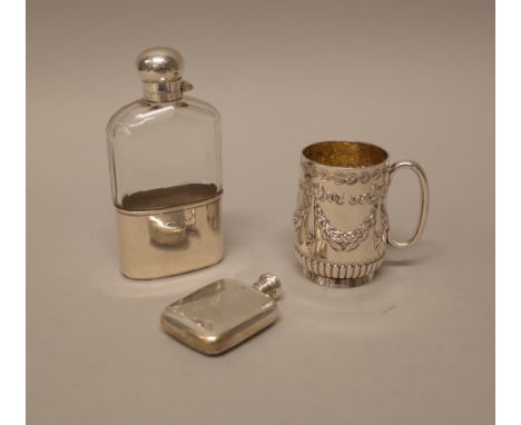 Silver and silver mounted wares, comprising; a Victorian christening mug, decorated with linen fold and foliate swags, above 