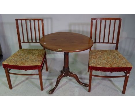 A George III and later mahogany tripod table on bird cage mount and three downswept supports 65cm wide x 68cm high and a pair