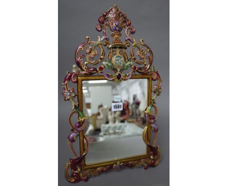 Jay Strongwater; a gilt metal and enamel strut back photograph frame, foliate design, limited edition 86/250, dated 2010, 48c