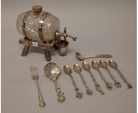 A Victorian silver sugar sifting spoon, with cast and pierced decoration, London 1854, a salt spoon and a christening fork, c