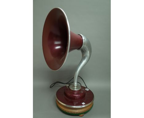 A J.S Stevens 1950s gramophone (converted) table lamp, raised on a later wooden plinth, 66cm high.