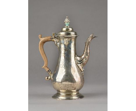 A late George II silver coffee pot, of baluster form, the hinged lid with a stylized bud finial, the body monogram engraved, 