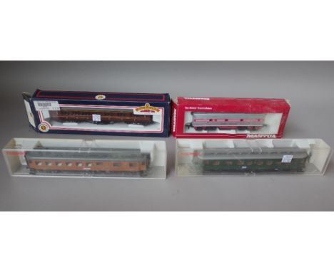 A quantity of OO gauge coaches, wagons and related accessories including; Bachmann, Mantua, Rivarossi, Luma, Fleischmann, Hor