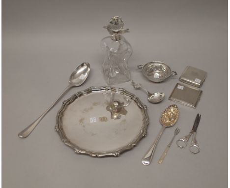 Silver and silver mounted wares, comprising; a glass dimple decanter, Birmingham 1925, a twin handled bonbon dish, with pierc