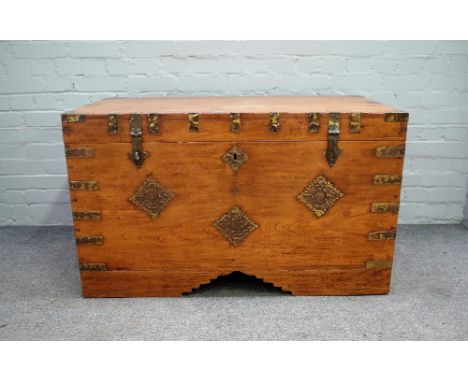 A 19th century Indian brass mounted teak trunk, with fitted interior, 112cm wide x 66cm high.