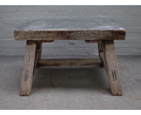 A metal topped bleached oak rectangular work bench/coffee table on heavy square supports, 99cm wide x 64cm high.