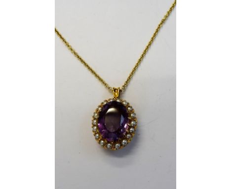 A gold, amethyst and cultured pearl pendant, claw set with the oval cut amethyst within a surround of cultured pearls, with a