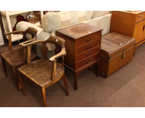 Pair early 20th Century occasional armchairs, mahogany four drawer music cabinet and vintage tin trunk (4).
