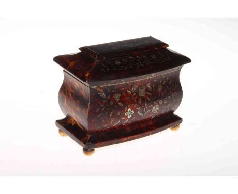 19th Century sarcophagus tortoiseshell inlaid with mother of pearl twin compartment tea caddy, raised on ivory bun feet.