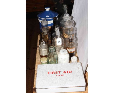 Collection of chemist bottles, jars and first aid case.
