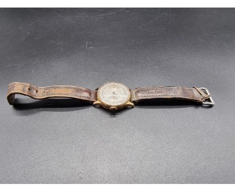 A vintage yellow metal Chronographe Swiss manual wind wristwatch,&nbsp;34mm, on leather strap. (a.f. alterations to case and 