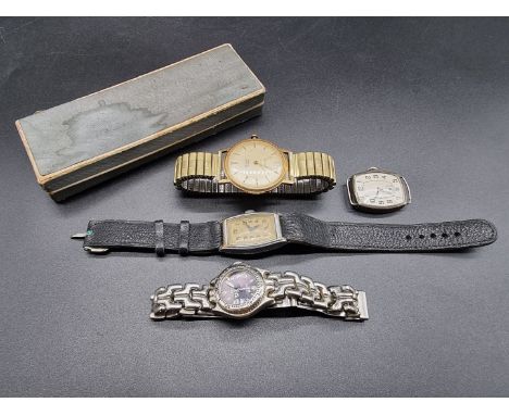 A vintage silver manual wind wristwatch, import mark Glasgow 1927; together with three other wristwatches. (4) 