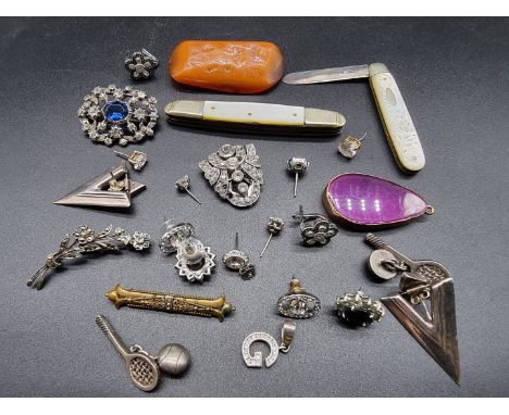 A small quantity of costume and white metal jewellery; together with a silver bladed fruit knife; and another penknife. 