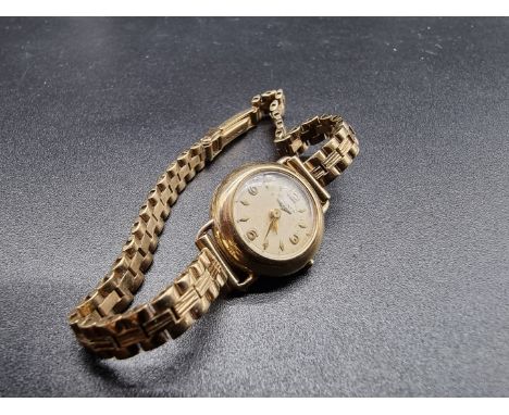 A vintage Longines 9ct gold ladies wristwatch, 18mm, Cal 13.15v, serial No 10615912. 