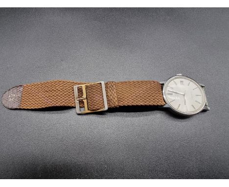 A 1970s Omega Geneve stainless steel manual wind wristwatch,&nbsp;35mm, Cal 1030, serial No 35832939, on replacement strap. 