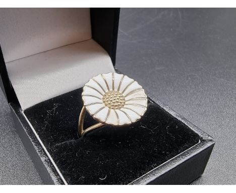 A Georg Jensen gold plated and white enamel Daisy ring, stamped 925, designed by Anton Michelsen, size O1/2. 