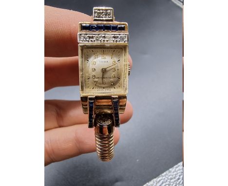 A 1940s Frenca 9ct gold diamond and sapphire set manual wind cocktail watch, 41mm, hallmarked London 1948. 